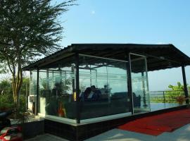 Honey Hives Family Club House，位于根尼亚古马里的酒店