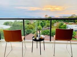 Top Floor Gorgeous Sunset View - Mae Phim Beachfront Condo，位于梅尔皮姆的公寓
