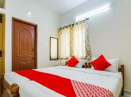 OYO 62412 Snekham Service Apartments，位于Madukkarai的酒店