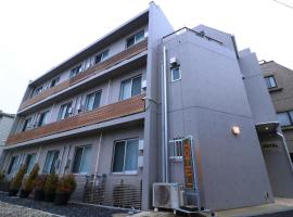 府中旭格兰杜尔经济型酒店，位于府中市Fuchunomori Park附近的酒店