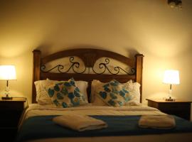 Sol de Luque Casa-hotel，位于西尔维奥·佩蒂罗西国际机场 - ASU附近的酒店