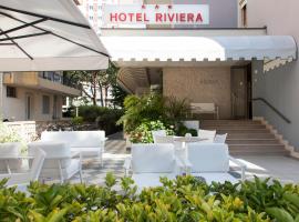 Hotel Riviera，位于利多迪耶索罗Piazza Milano的酒店