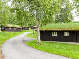 Groven Camping & Hyttegrend，位于Åmot的木屋