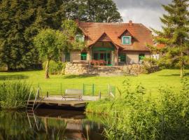 J1 Idyllisches Ferienhaus mit Seeblick，位于Jülchendorf的度假短租房