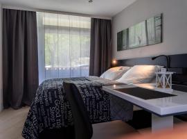 Studio 20qm mit Balkon und Innenpool - 22030，位于施卢赫湖的酒店