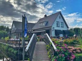 范·德容格女士酒店餐厅，位于羊角村的酒店