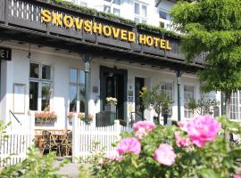 斯库舒韦德酒店，位于夏洛滕隆巴肯游乐场附近的酒店