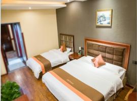 骏怡连锁四川成都郫都区郫都大学城店，位于成都的酒店