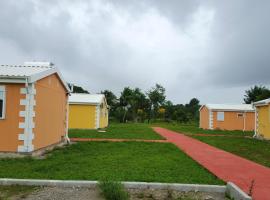 Maison charmante à Macouria avec jardin et climatisation.，位于Guenouillet的酒店