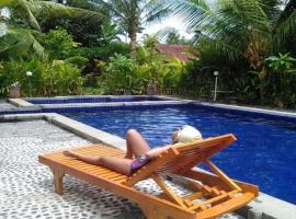 Air Sanih Homestay，位于新加拉惹的酒店
