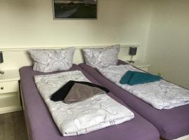 Haus D&uuml;nenblick (OG)，位于博尔库姆的带热水浴缸的酒店