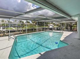 Canalfront Home with Dock and Pool 5 Mi to Ft Myers!，位于北迈尔斯堡的Spa酒店