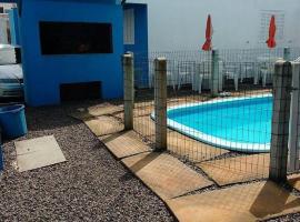 Residencial Água Azul，位于卡庞达卡诺阿的带泳池的酒店