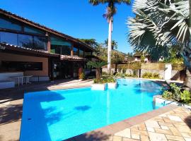 Monalisa Guesthouse Pé na Areia Ilhabela，位于伊利亚贝拉的带泳池的酒店