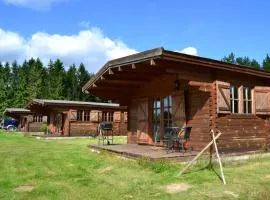 Semestra i timmerstuga