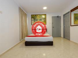 OYO 1090 Hollitel Hotel Melaka，位于马六甲的酒店