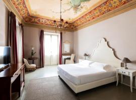 文咖啡酒店，位于阿尔巴的住宿