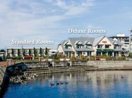 Sidney Waterfront Inn & Suites，位于悉尼Washington State Ferries附近的酒店