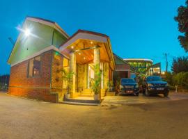 Shangri-la Hotel Muyenga，位于Bugolobi的酒店