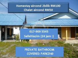 chalet aircond RM50 homestay aircond RM100 Kakmah pantai timur guest house，位于瓜拉丁加奴的酒店