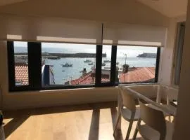 Ático en el puerto con vistas al mar