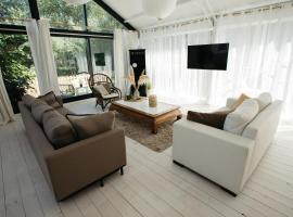 Vakantiewoning Loft Lisse - SAUNA - Beach - Keukenhof，位于丽兹的度假屋