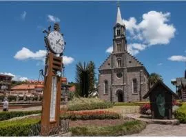 Suite em Gramado, próxima a Avenida das Hortencias