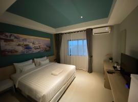 Dhanakarn Hotel，位于春武里的酒店