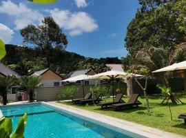 The Temak Villa，位于珍南海滩巴雅岛海洋公园附近的酒店