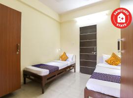 SPOT ON 63514 Hotel Signature，位于Jalālpur的酒店
