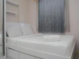 Comfortable 2BR Green Pramuka City Apartment By Travelio