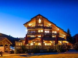 Hotel Cote Brune，位于莱德萨阿尔卑斯多姆诺尔德滑雪缆车附近的酒店