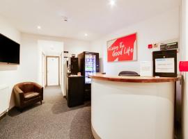 Snooze Hotel，位于科比的酒店