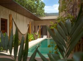 Ya'ax Hotel Boutique，位于梅里达的酒店