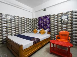 CAPITAL O75153 Janaki Stay，位于马迪凯里的酒店