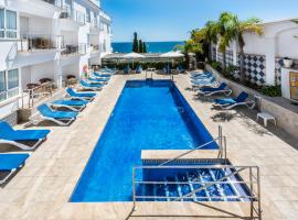 托波萨阿帕尔图里斯酒店，位于内尔哈Caletilla Beach的酒店