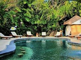 普瑞岑达纳度假酒店巴厘岛，位于塞米亚克塞米亚克海滩的酒店