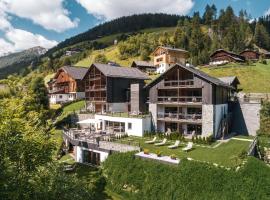Les Dolomites Mountain Lodges，位于圣马蒂诺-因巴迪亚普兹奥德尔自然公园附近的酒店