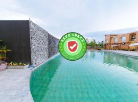 RedDoorz Premium near Health Centrum Banica，位于罗哈斯城的酒店
