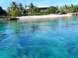 Pension Tiputa Lodge Rangiroa，位于TiputaTiputa Pass潜水中心附近的酒店