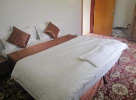 القاعة الذهبية للأجنحة الفندقية，位于Al Buhrah的酒店