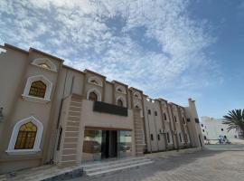 达纳阿尔卡勒酒店，位于Ḩilf的住所