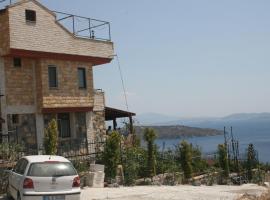 Tas Ev Hotel，位于Çandarlı的酒店