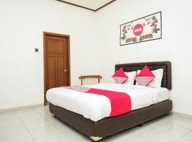 Super OYO 353 Loesje Guest House Syariah，位于玛琅的酒店