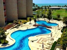 Apartamento em Condomínio Resort vizinho ao Beach Park