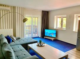 Słupsk forest PREMIUM HOTEL APARTAMENT M6 - Kaszubska street 18 - Wifi Netflix Smart TV50 - two bedrooms two extra large double beds - up to 6 people full - pleasure quality stay，位于斯武普斯克的公寓