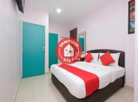 OYO 89877 Sun Triang Hotel，位于Kampong Kerayong的酒店