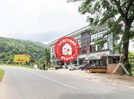 Capital O 45063 Munnar Dale Inn，位于Neriyamangalam的酒店