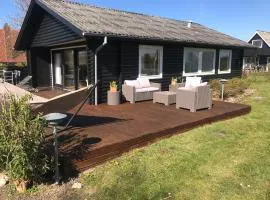 Dejlig sommerhus 150m fra privat strand