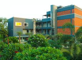 KRISHNA RIVERSIDE RESORT，位于Vasad的酒店